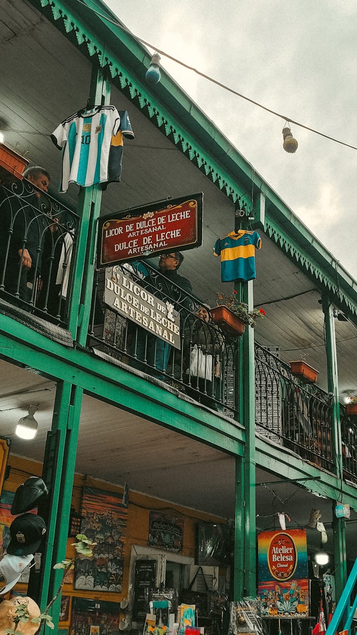Vibrant scene at San Telmo Market in Buenos Aires with colorful facades and local culture.